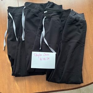 Three pairs of figs brand Zamora style jogger black (all are medium tall)